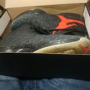 A pair of jordan 29 team orange